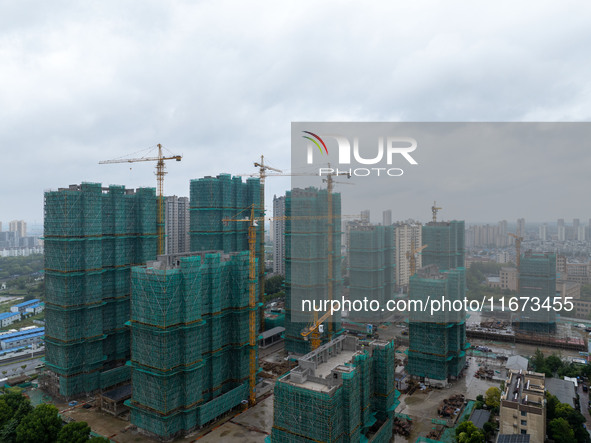 A real estate project is under construction in Qingjiangpu District, Huai'an City, Jiangsu Province, China, on October 17, 2024. 