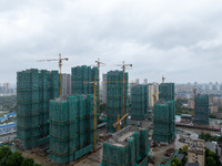 A real estate project is under construction in Qingjiangpu District, Huai'an City, Jiangsu Province, China, on October 17, 2024. (