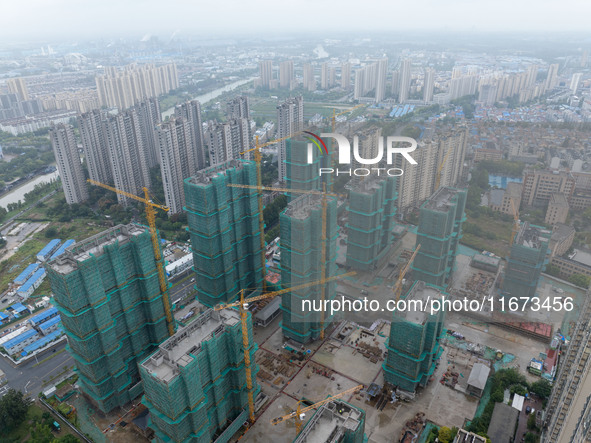 A real estate project is under construction in Qingjiangpu District, Huai'an City, Jiangsu Province, China, on October 17, 2024. 