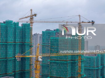 A real estate project is under construction in Qingjiangpu District, Huai'an City, Jiangsu Province, China, on October 17, 2024. (