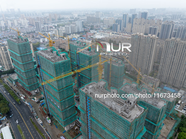 A real estate project is under construction in Qingjiangpu District, Huai'an City, Jiangsu Province, China, on October 17, 2024. 