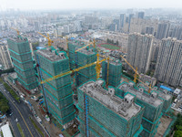 A real estate project is under construction in Qingjiangpu District, Huai'an City, Jiangsu Province, China, on October 17, 2024. (