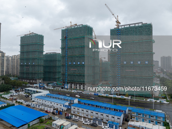 A real estate project is under construction in Qingjiangpu District, Huai'an City, Jiangsu Province, China, on October 17, 2024. 