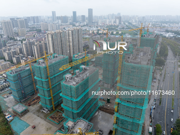 A real estate project is under construction in Qingjiangpu District, Huai'an City, Jiangsu Province, China, on October 17, 2024. 