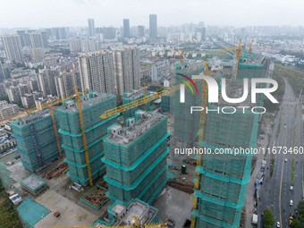 A real estate project is under construction in Qingjiangpu District, Huai'an City, Jiangsu Province, China, on October 17, 2024. (