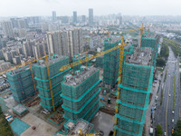 A real estate project is under construction in Qingjiangpu District, Huai'an City, Jiangsu Province, China, on October 17, 2024. (