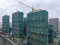 A real estate project is under construction in Qingjiangpu District, Huai'an City, Jiangsu Province, China, on October 17, 2024. (