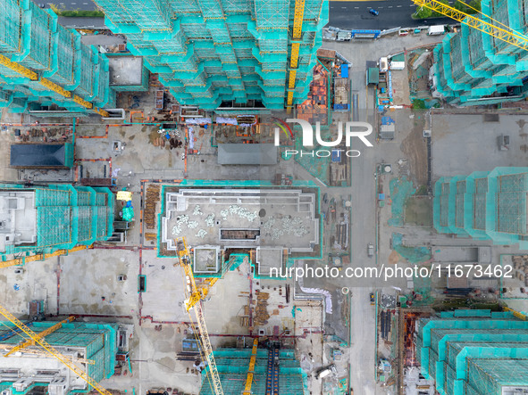 A real estate project is under construction in Qingjiangpu District, Huai'an City, Jiangsu Province, China, on October 17, 2024. 