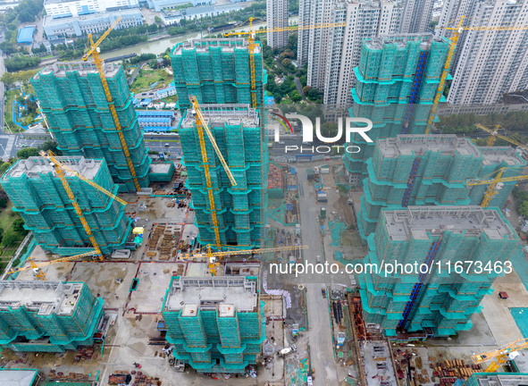 A real estate project is under construction in Qingjiangpu District, Huai'an City, Jiangsu Province, China, on October 17, 2024. 