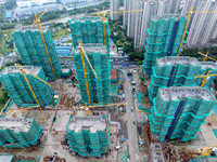 A real estate project is under construction in Qingjiangpu District, Huai'an City, Jiangsu Province, China, on October 17, 2024. (