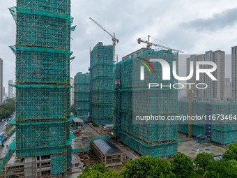 A real estate project is under construction in Qingjiangpu District, Huai'an City, Jiangsu Province, China, on October 17, 2024. (