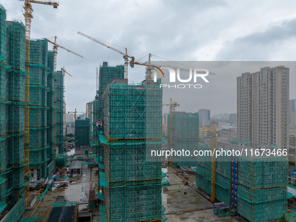 A real estate project is under construction in Qingjiangpu District, Huai'an City, Jiangsu Province, China, on October 17, 2024. 