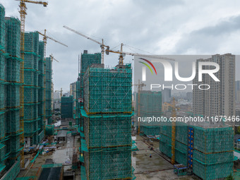 A real estate project is under construction in Qingjiangpu District, Huai'an City, Jiangsu Province, China, on October 17, 2024. (