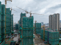 A real estate project is under construction in Qingjiangpu District, Huai'an City, Jiangsu Province, China, on October 17, 2024. (