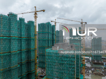 A real estate project is under construction in Qingjiangpu District, Huai'an City, Jiangsu Province, China, on October 17, 2024. (