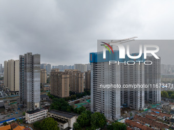 A real estate project is under construction in Qingjiangpu District, Huai'an City, Jiangsu Province, China, on October 17, 2024. (