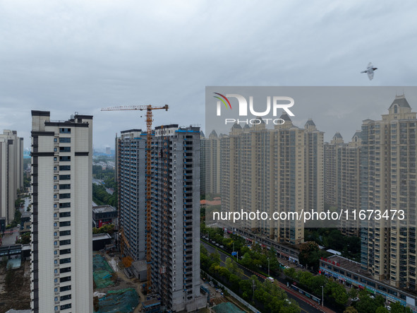 A real estate project is under construction in Qingjiangpu District, Huai'an City, Jiangsu Province, China, on October 17, 2024. 