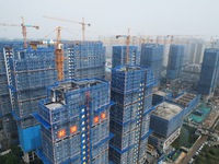 An aerial view shows a building under construction in Hangzhou, China, on October 17, 2024. (