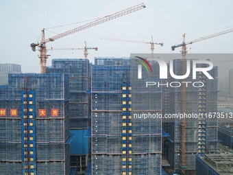 An aerial view shows a building under construction in Hangzhou, China, on October 17, 2024. (