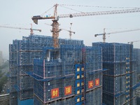 An aerial view shows a building under construction in Hangzhou, China, on October 17, 2024. (