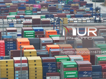 Containers are seen at the Longtan Port area of Nanjing Port in Nanjing, Jiangsu province, China, on October 17, 2024. (