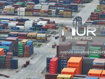 Trucks are seen at the Longtan Port area of Nanjing Port in Nanjing, Jiangsu province, China, on October 17, 2024. (