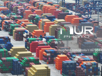 Containers are seen at the Longtan Port area of Nanjing Port in Nanjing, Jiangsu province, China, on October 17, 2024. (