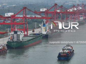 Cargo ships dock at the container terminal of Longtan Port Area of Nanjing Port in Nanjing, Jiangsu province, China, on October 17, 2024. (