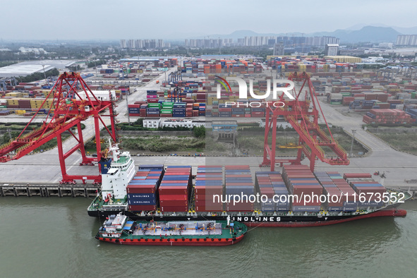 Cargo ships dock at the container terminal of Longtan Port Area of Nanjing Port in Nanjing, Jiangsu province, China, on October 17, 2024. 