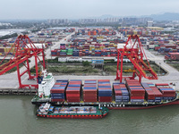 Cargo ships dock at the container terminal of Longtan Port Area of Nanjing Port in Nanjing, Jiangsu province, China, on October 17, 2024. (