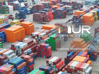 Containers are seen at the Longtan Port area of Nanjing Port in Nanjing, Jiangsu province, China, on October 17, 2024. (