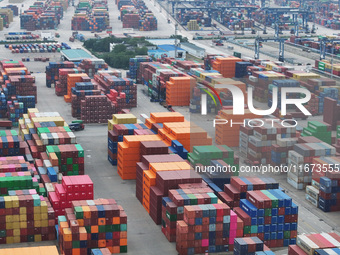 Containers are seen at the Longtan Port area of Nanjing Port in Nanjing, Jiangsu province, China, on October 17, 2024. (