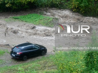 Floods and flooding occur in the village of Maclas, Loire department in France, on October 17, 2024. (