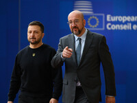 Ukraine's president Volodymyr Zelensky and European Council President Charles Michel arrive to attend the two-day European Council summit in...