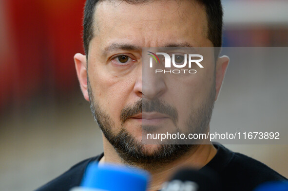 Ukraine's president Volodymyr Zelensky addresses the press as he arrives to attend the two-day European Council summit in Brussels, Belgium,...