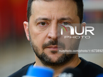 Ukraine's president Volodymyr Zelensky addresses the press as he arrives to attend the two-day European Council summit in Brussels, Belgium,...