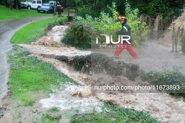 Floods and flooding occur in the village of Pelussin, Loire department, in France, on October 17, 2024. 