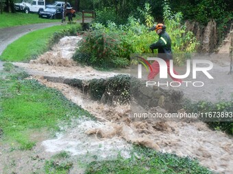 Floods and flooding occur in the village of Pelussin, Loire department, in France, on October 17, 2024. (