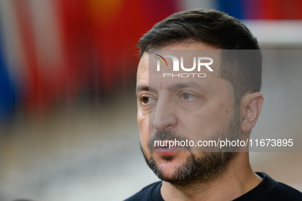 Ukraine's president Volodymyr Zelensky addresses the press as he arrives to attend the two-day European Council summit in Brussels, Belgium,...