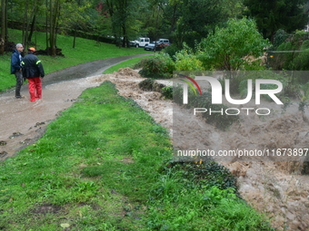 Floods and flooding occur in the village of Pelussin, Loire department, in France, on October 17, 2024. (