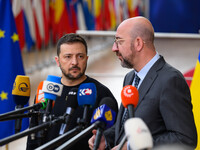 Ukraine's president Volodymyr Zelensky and European Council President Charles Michel address the press as they arrive to attend the two-day...