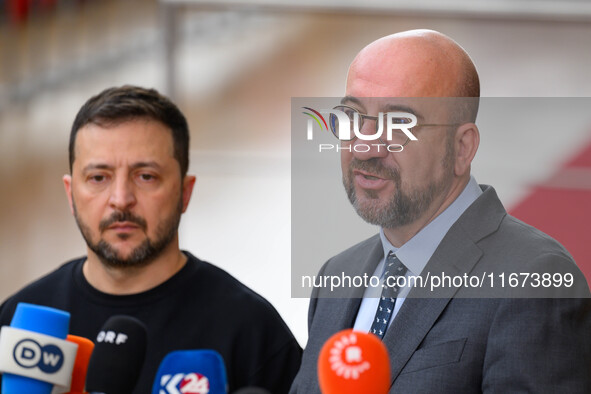 Ukraine's president Volodymyr Zelensky and European Council President Charles Michel address the press as they arrive to attend the two-day...