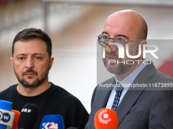 Ukraine's president Volodymyr Zelensky and European Council President Charles Michel address the press as they arrive to attend the two-day...