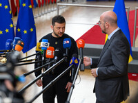 Ukraine's president Volodymyr Zelensky and European Council President Charles Michel address the press as they arrive to attend the two-day...