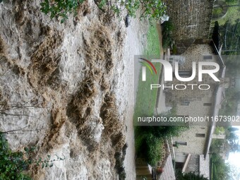 Floods and flooding occur in the village of Pelussin, Loire department, in France, on October 17, 2024. (