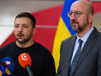 Ukraine's president Volodymyr Zelensky and European Council President Charles Michel address the press as they arrive to attend the two-day...