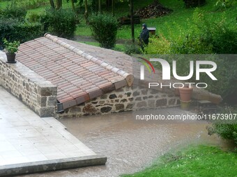 Floods and flooding occur in the village of Pelussin, Loire department, in France, on October 17, 2024. (