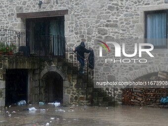 Floods and flooding occur in the village of Pelussin, Loire department, in France, on October 17, 2024. (