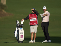 Rasmus Hojgaard of Denmark talks with his caddie on the 10th hole on day one of the Estrella Damm N.A. Andalucia Masters 2024 at Real Club d...