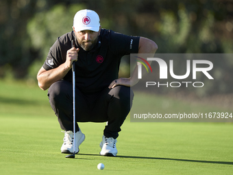 Jon Rahm of Spain studies his shot on the 10th green on day one of the Estrella Damm N.A. Andalucia Masters 2024 at Real Club de Golf Sotogr...